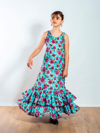 Vestido infantil de baile flamenco, modelo Aitana de Paralola. En color verde agua con flores buganvilla y lunares blancos.